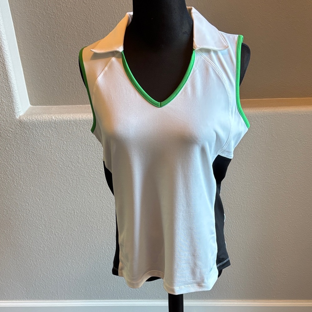 Izod Cool-FX Sleeveless golf shirt size M
Polyester and spandex